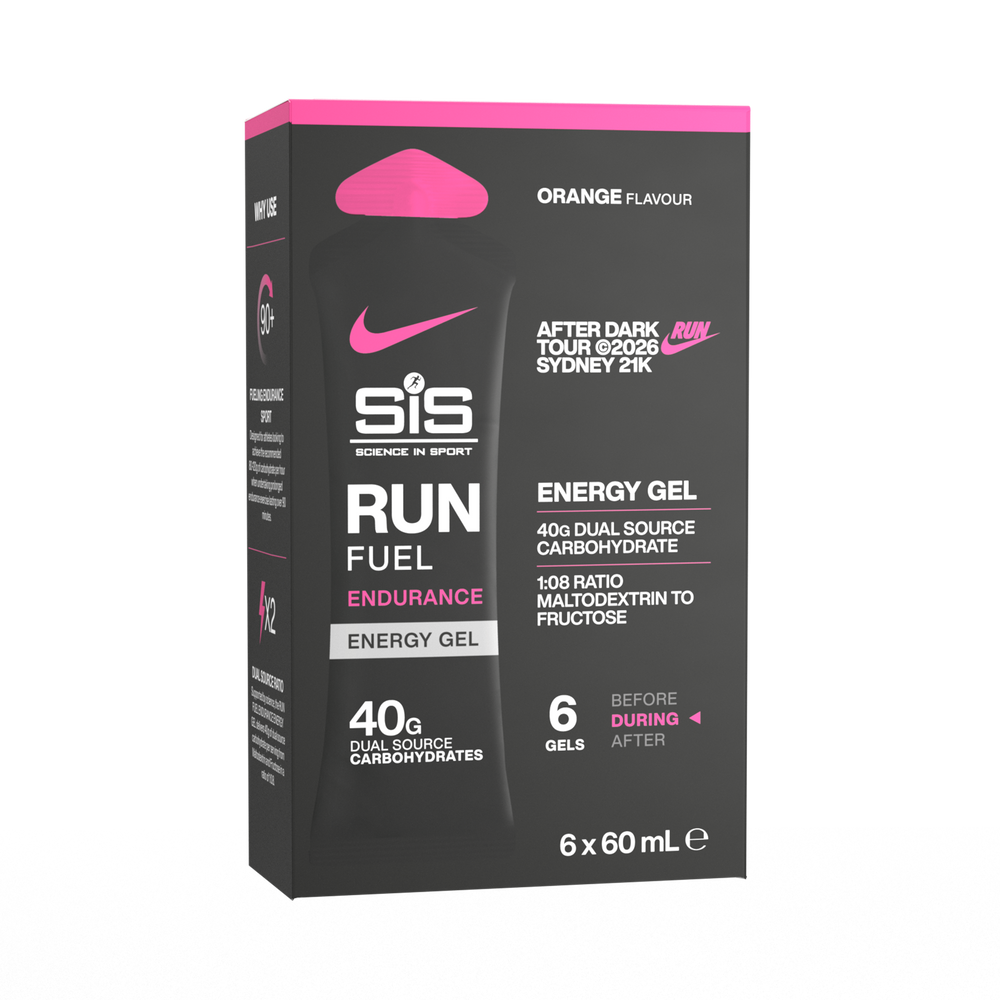 A box of SIS Run Fuel Energy Gel, orange flavour, containing 6 x 60 mL gel packets. The packaging is primarily black with bright pink accents, white text, and a pink Nike swoosh logo.