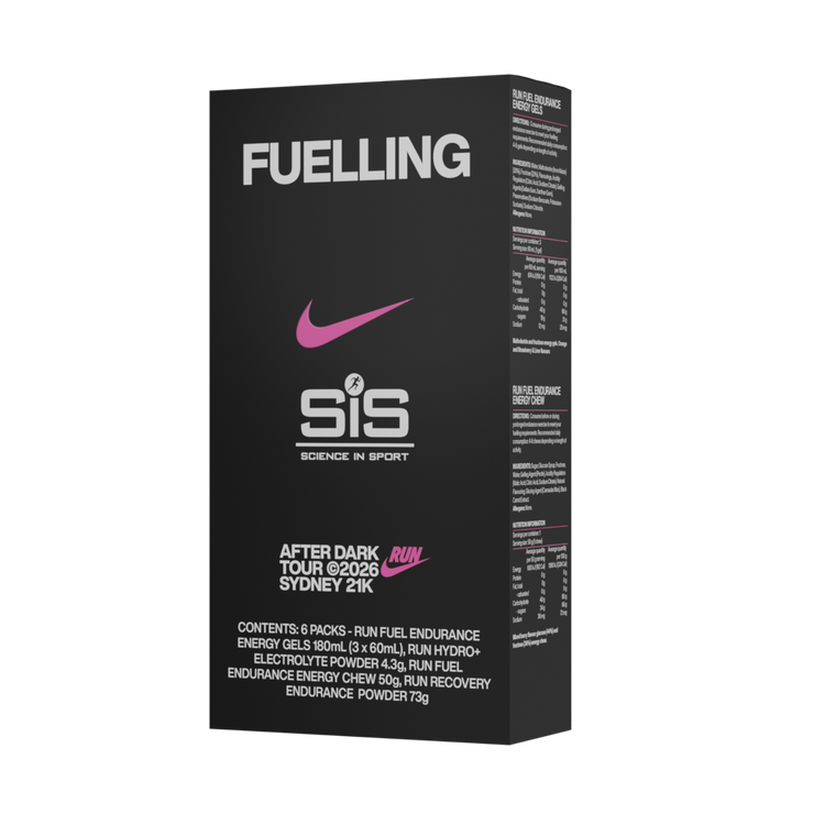 A tall black product box for Nike SIS Fueling After Dark Tour 2026 Sydney 21K, featuring a pink Nike swoosh and white and pink text on a clean white background.