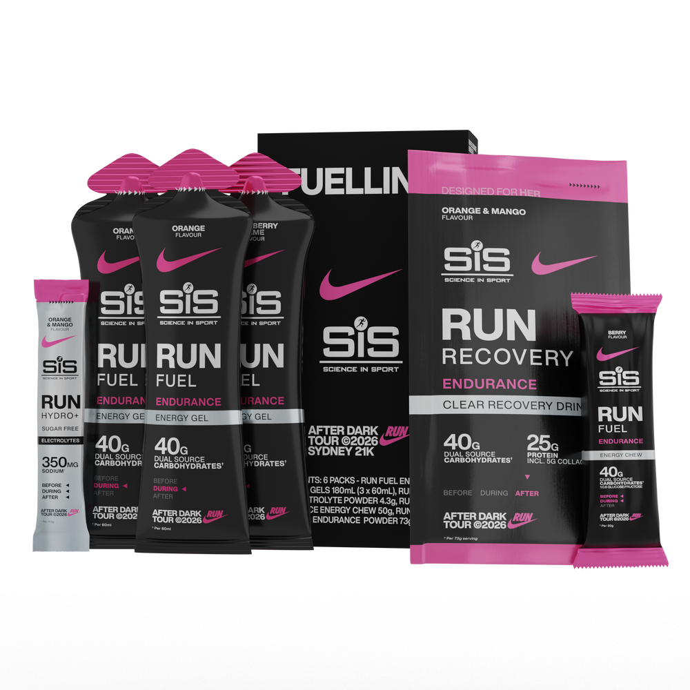 A group of SIS Run Fuel sports nutrition products, including black and pink pouches and packets of energy gel, recovery drink, and energy chocolate, arranged on a white background.