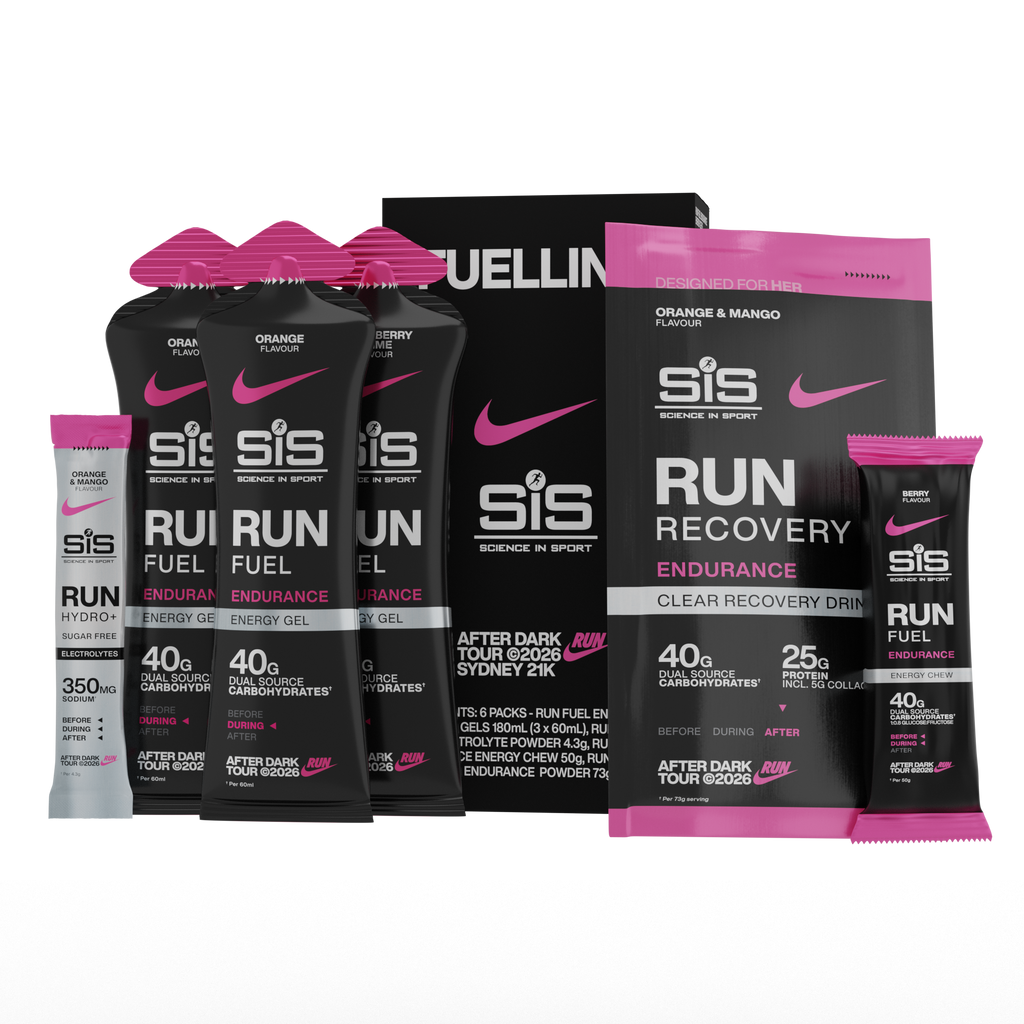 A group of SIS Run Fuel sports nutrition products, including black and pink pouches and packets of energy gel, recovery drink, and energy chocolate, arranged on a white background.